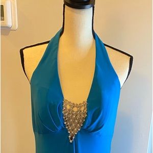 Beautiful halter evening gown with diamond stud detailing.